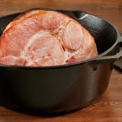 Lodge Cast Iron Dutch Oven. Pre-Seasoned Pot with Lid and Dual Loop Handle,  5 Liter 