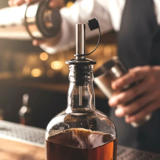 Kitchen Craft Stainless Steel Liquor Pourer With a Tapered spout and a rubber dust cup