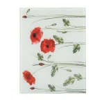 Candlelight elegant glass cutting board with a vibrant field of red poppies 