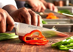 Food preparation tools including cutting boards knives and mixing bowls for commercial kitchens in Kenya