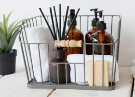 Sustainable kitchen organisation — Living Nostalgia wire storage baskets and compost bin at Vituzote Kenya