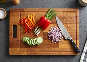 Food preparation using chopping boards in kitchen