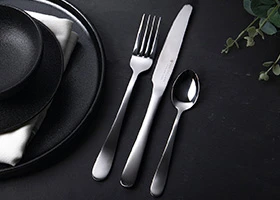 Different types of cutlery – knives, forks, spoons, and serving utensils