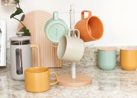 Wire fruit basket, serving stand and mug tree for kitchen display storage