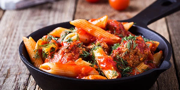 Cooking tomatoes in cast iron pan