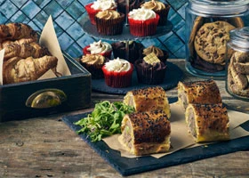 Trending serveware styles in Kenya: minimalist white, tiered stands, and rustic boards