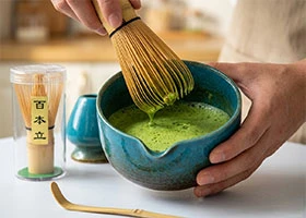 Modern tea accessories including matcha sets and tea infusers