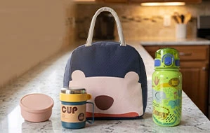 School desk and everyday school supplies prepared for a new term